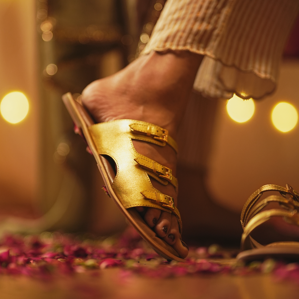 
                      
                        Traya Gold Sandals
                      
                    