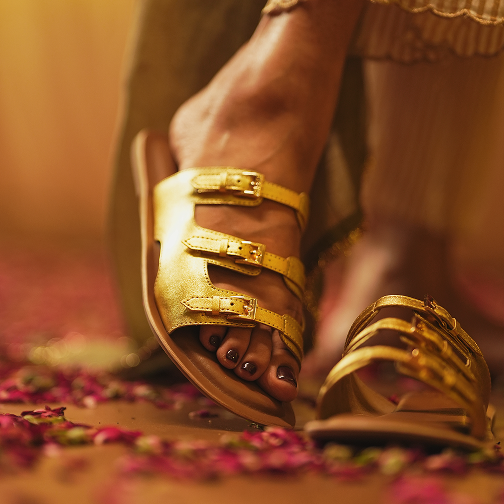 
                      
                        Traya Gold Sandals
                      
                    