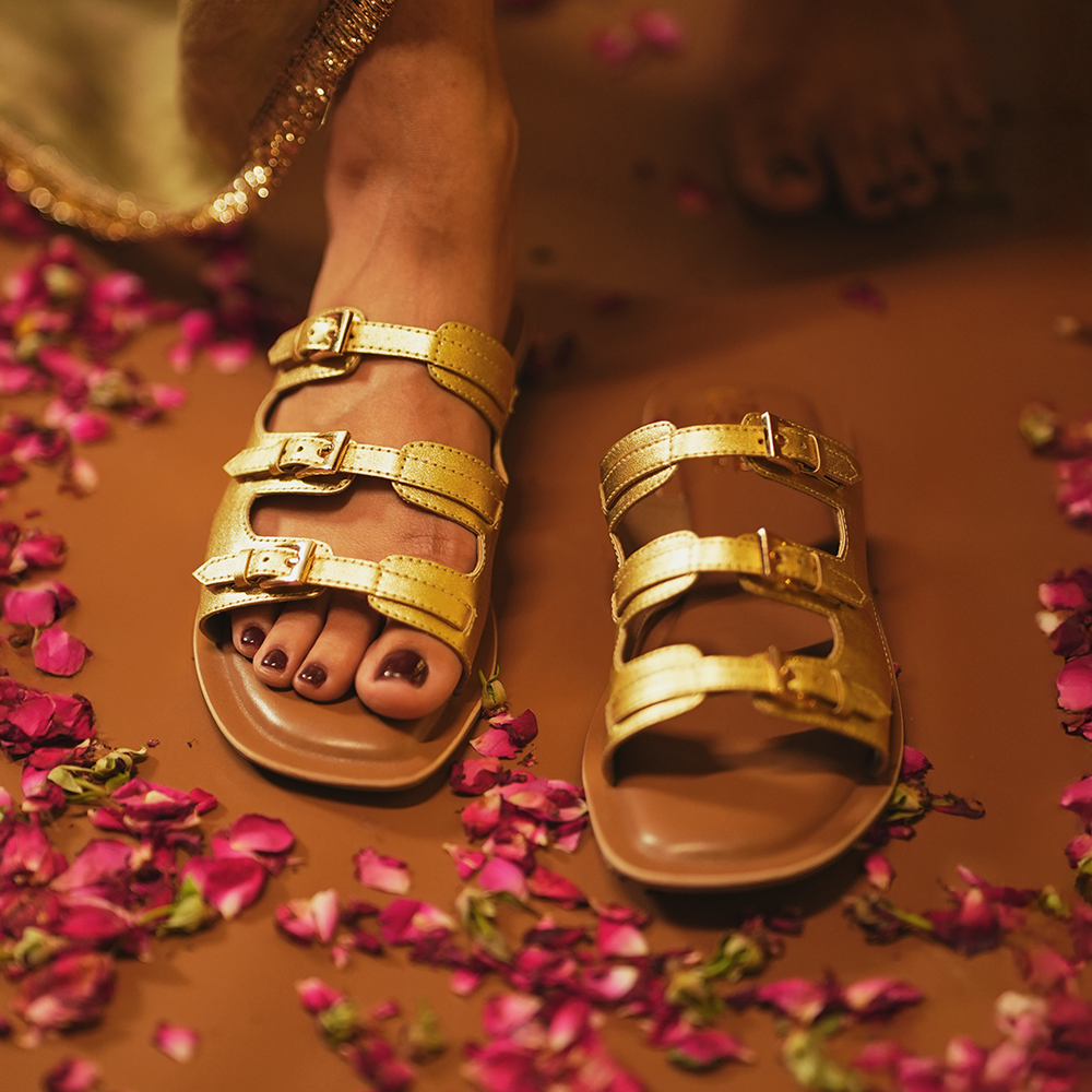 
                      
                        Traya Gold Sandals
                      
                    